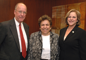 Marcia Cypen, Executive Director of Legal Services of Greater Miami (right), stands with Eugene Stearns of Stearns Weaver Miller, and Donna E. Shalala, President of the University of Miami.