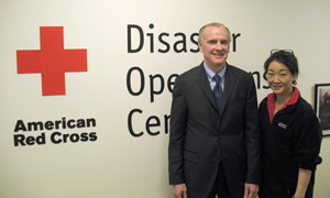 James J. Sandman, president of LSC, stands with Julie K. Choi, senior director for disaster partnerships at the Red Cross.
