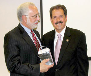 Congressman Jos E. Serrano (right) and LSC President Victor M. Fortuno at LSC's Hispanic Heritage Month celebration.