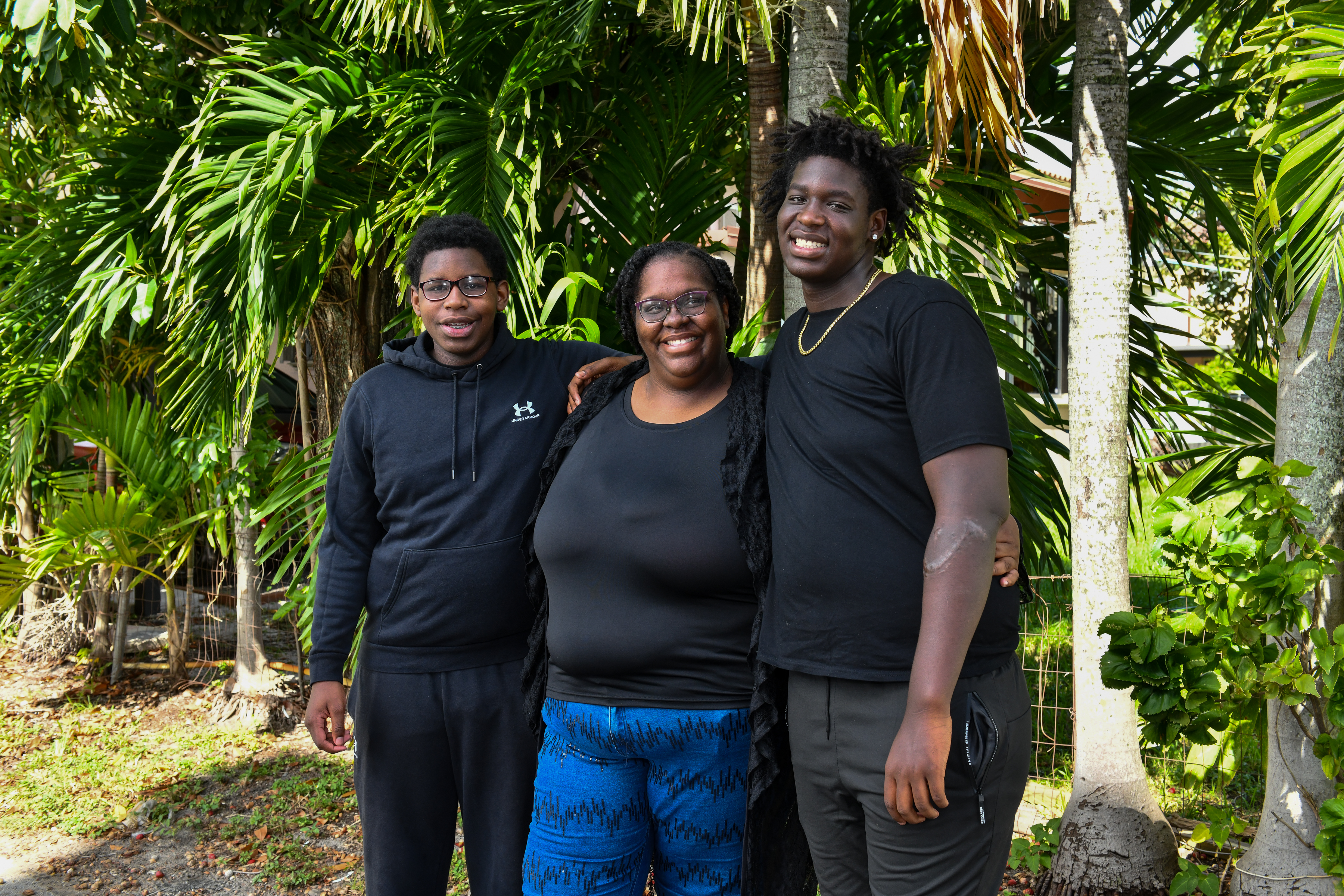 Group picture of mother with two sons