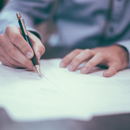lsc.org_-_site_asset_-_stock_image_-_signing_documents2x