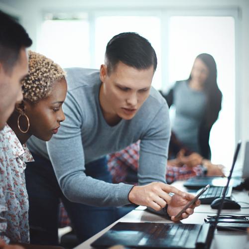 team working on the computer