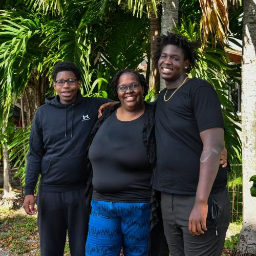Group picture of mother with two sons