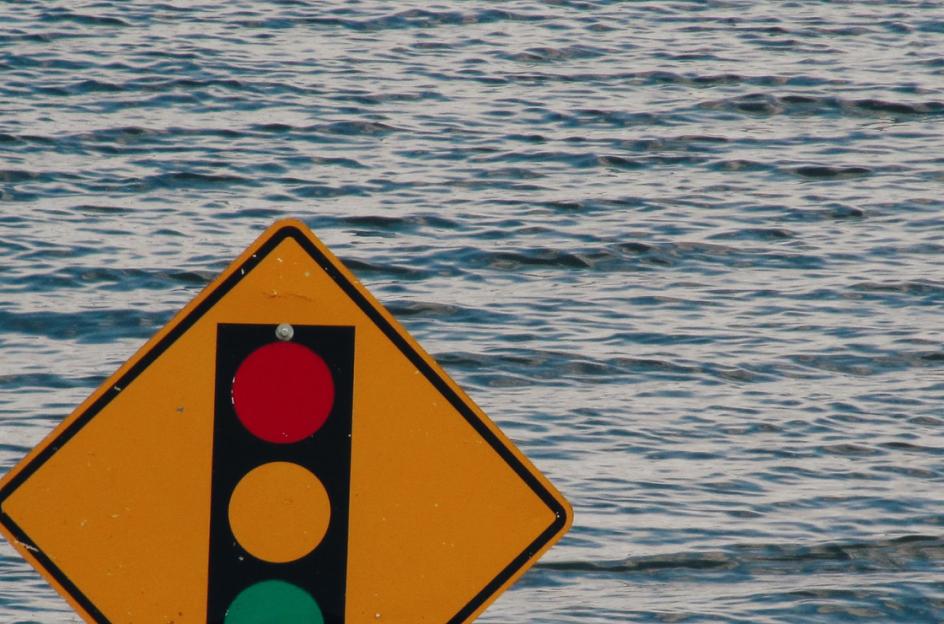 Stop sign in flooding water