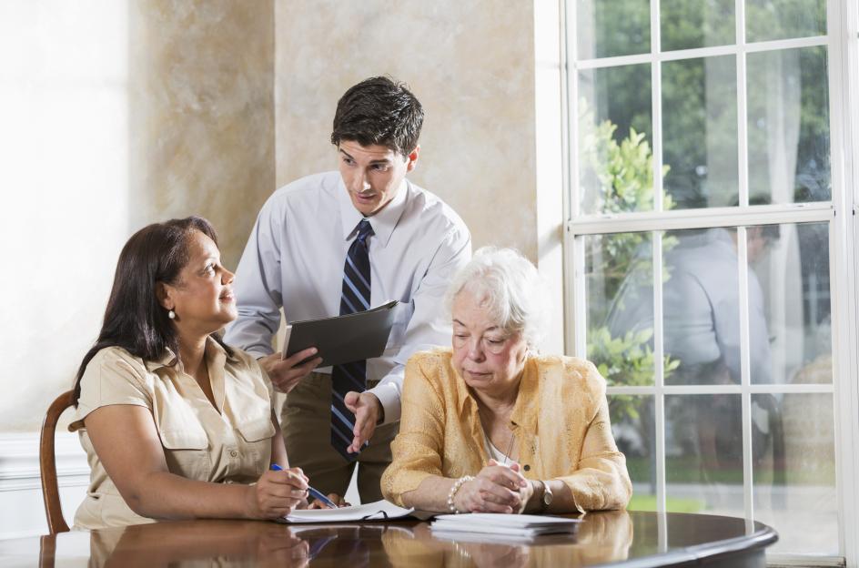 senior woman receiving legal help.
