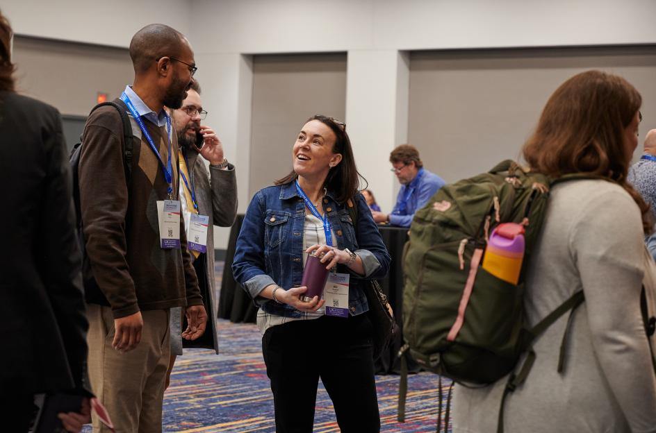 People connecting at a tech conference