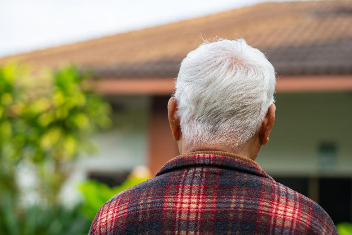 senior man with back to camera