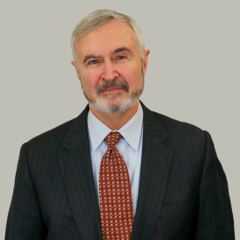 Headshot of John Malcolm 